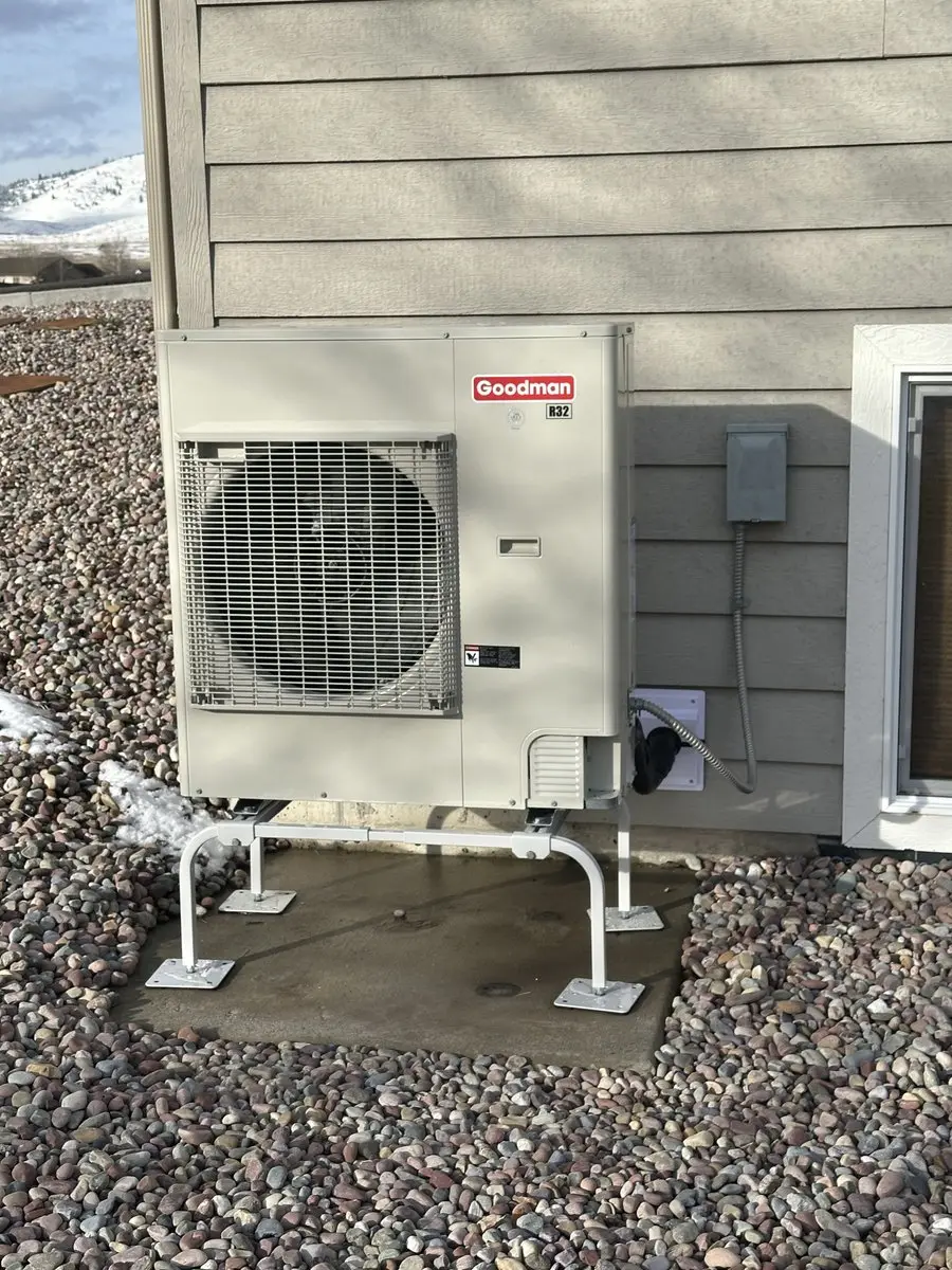 Goodman unit with Montana mountains