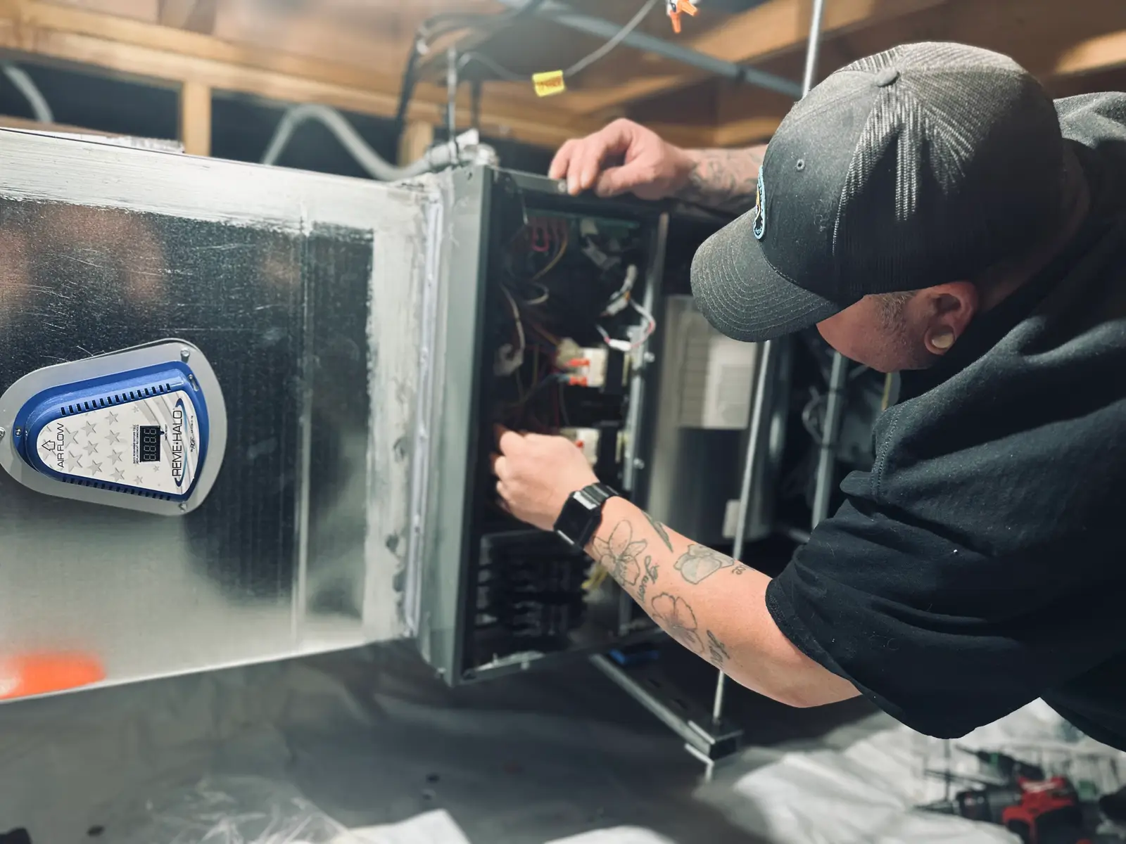 Robert installing REMI Halo air purification system